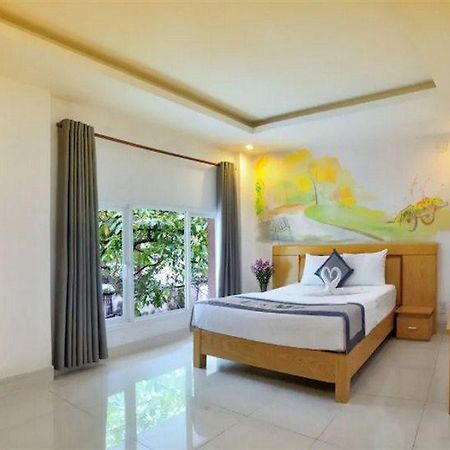 U And Me Hotel Tan Phong Exterior foto